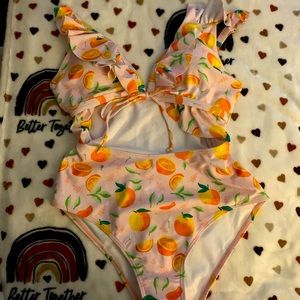 SHEIN one-piece orange cut out bathing suit